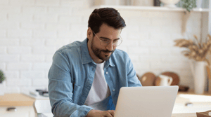 Man remote working on laptop